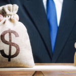 Biden Wants American Taxpayers To Pay for Illegals To Stay Home Andrii Yalanskyi / shutterstock.com