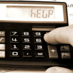 You’re Not Alone: Most Adult Americans Are Living Paycheck to Paycheck Neale Cousland / shutterstock.com