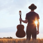 Next “Rich Men North of Richmond” Singer Gets Banished from Venue for Anti-Woke Song Song_about_summer / shutterstock.com